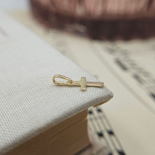 9k gold cross charm