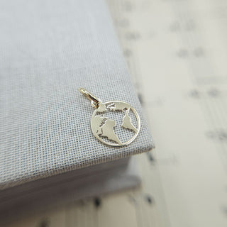 gold planet earth charm