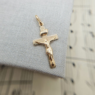 small solid gold crucifix pendant