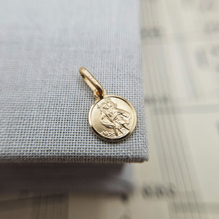 tiny round st christopher charm in solid 9ct gold