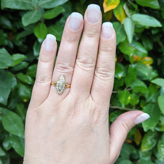 antique diamond ring on hand