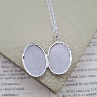 photo locket with 2 space inside