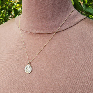 another view of gold saint christopher necklace