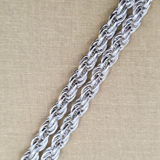 close up of rope links on silver chain