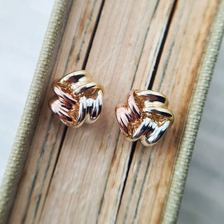 three gold knot stud earrings