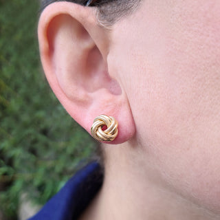 earrings in ladies ear