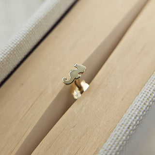 seahorse shaped labret stud in 9ct yellow gold