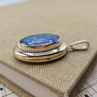 Beautiful piping detail around the edge of the bezel set opal.
