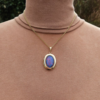 Locket being worn, paired with a solid gold belcher chain