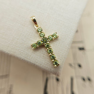 peridot cross pendant in solid 9ct gold