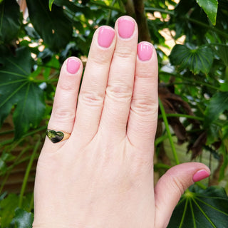 women's signet ring on hand