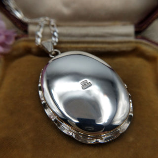 British hallmark of reverse of locket