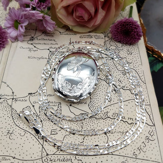 large oval locket available with figaro chain