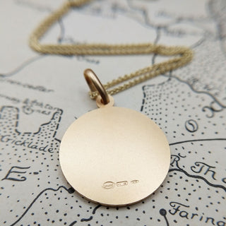 reverse of christopher pendant is engraveable