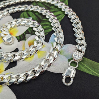 close up of Cuban links and lobster clasp on solid sterling silver chain