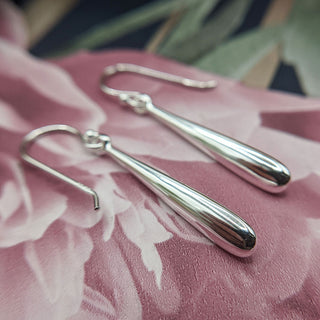 close up of 925 silver teardrop earrings