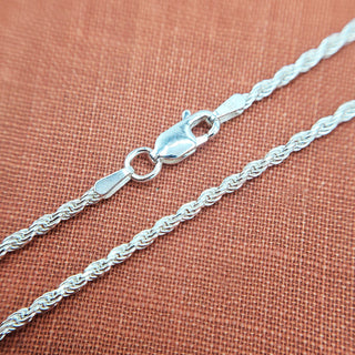 Close up of sterling silver rope chain showing diamond cut facets