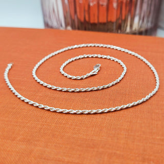 Silver rope chain necklace with visible 925 stamp