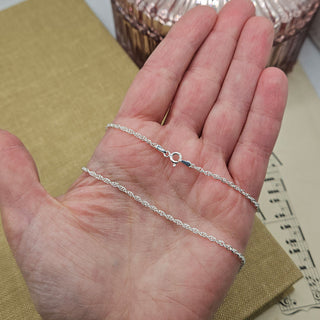 sterling silver prince of wales chain in hand for scale