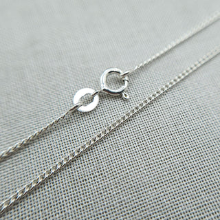 spring ring clasp on curb chain