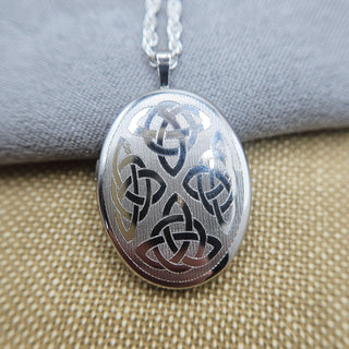 oval celtic symbol locket in sterling silver