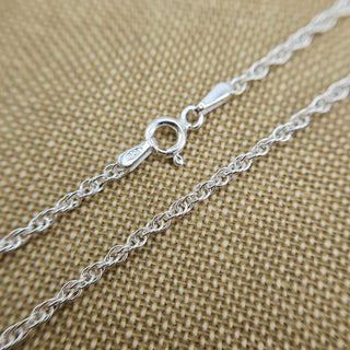 close up of prince of wales silver chain, sold with photo locket