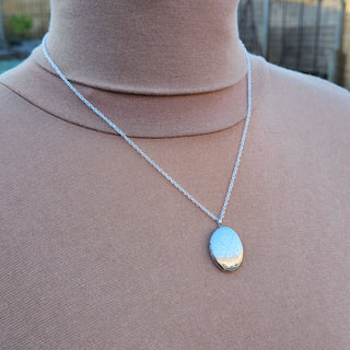 oval photo locket necklace with celtic design