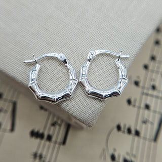 very small silver bamboo hoops