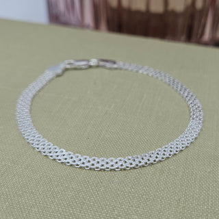 Close up of 4mm wide flat Bismark weave pattern in hallmarked 925 sterling silver bracelet
