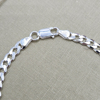 lobster clasp on men's silver bracelet