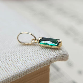 tiny gold and green baguette charm