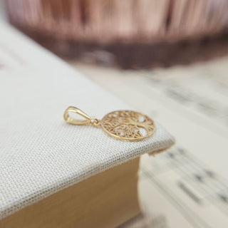 dainty 9ct gold tree of life charm pendant
