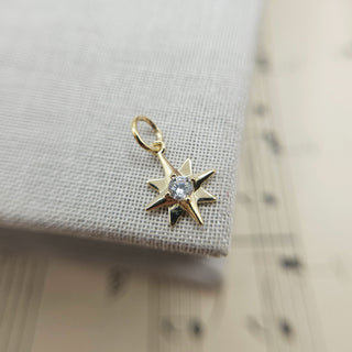 solid gold star charm with cz