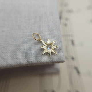 underside of gold star charm