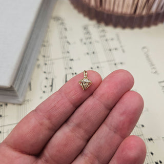 small gold charm pendant with cz