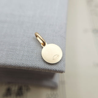 back of gold st chris charm