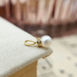 real gold charm with freshwater pearl