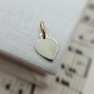 Mini Gold Starburst Heart Charm