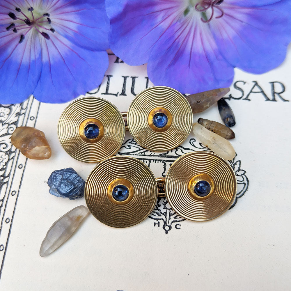 solid gold and sapphire cuff links