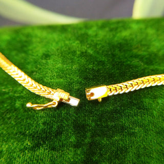 18ct yellow gold, emerald and diamond necklace