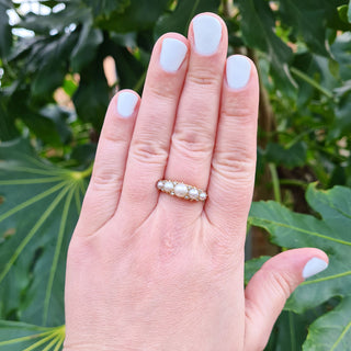 vintage pearl ring on hand