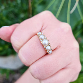 vintage pearl ring on hand