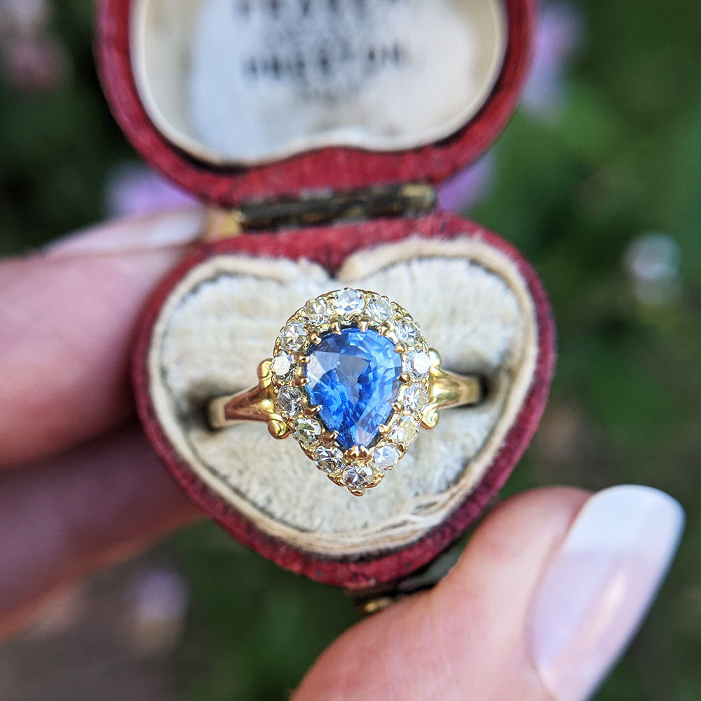 sapphire ring in it's vintage heart ring box