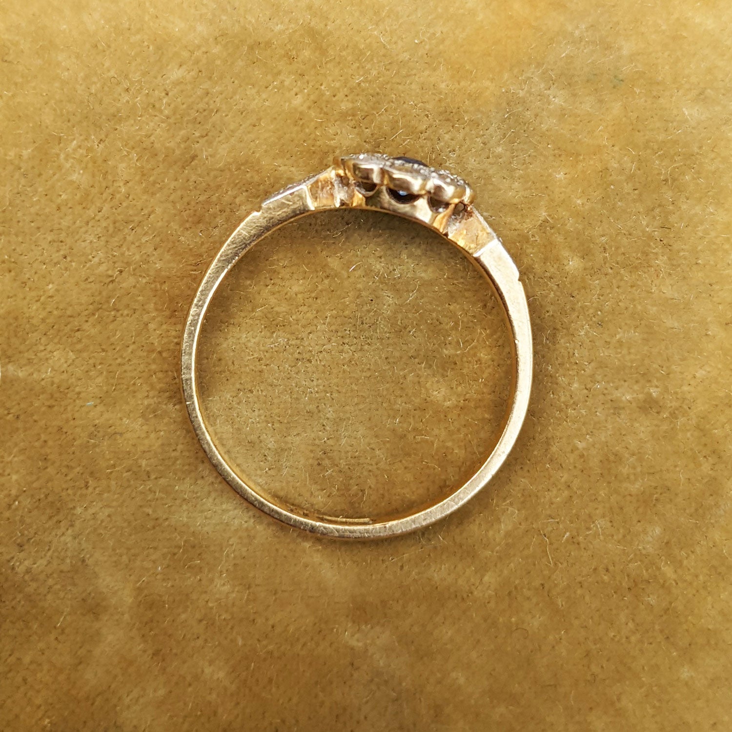 side profile of antique sapphire and diamond ring