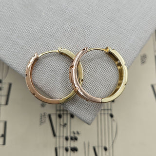 rose and yellow gold huggie hoop earrings in 14K