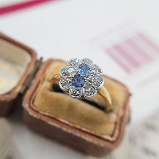 close up of vintage cushion cut sapphire ring