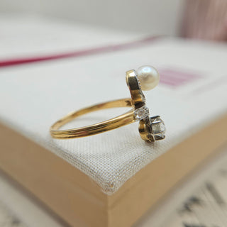 close up of channeled shank on antique diamond and pearl ring