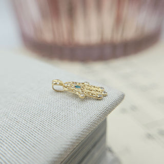 real gold hamsa pendant with cz stones