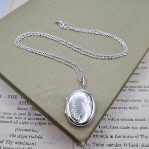 women's silver oval locket and chain