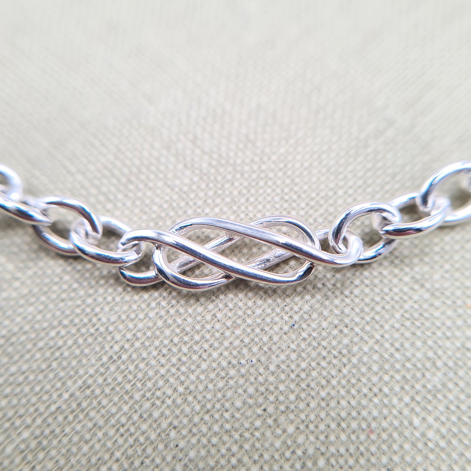 close up of celtic knot links on women's 925 bracelet